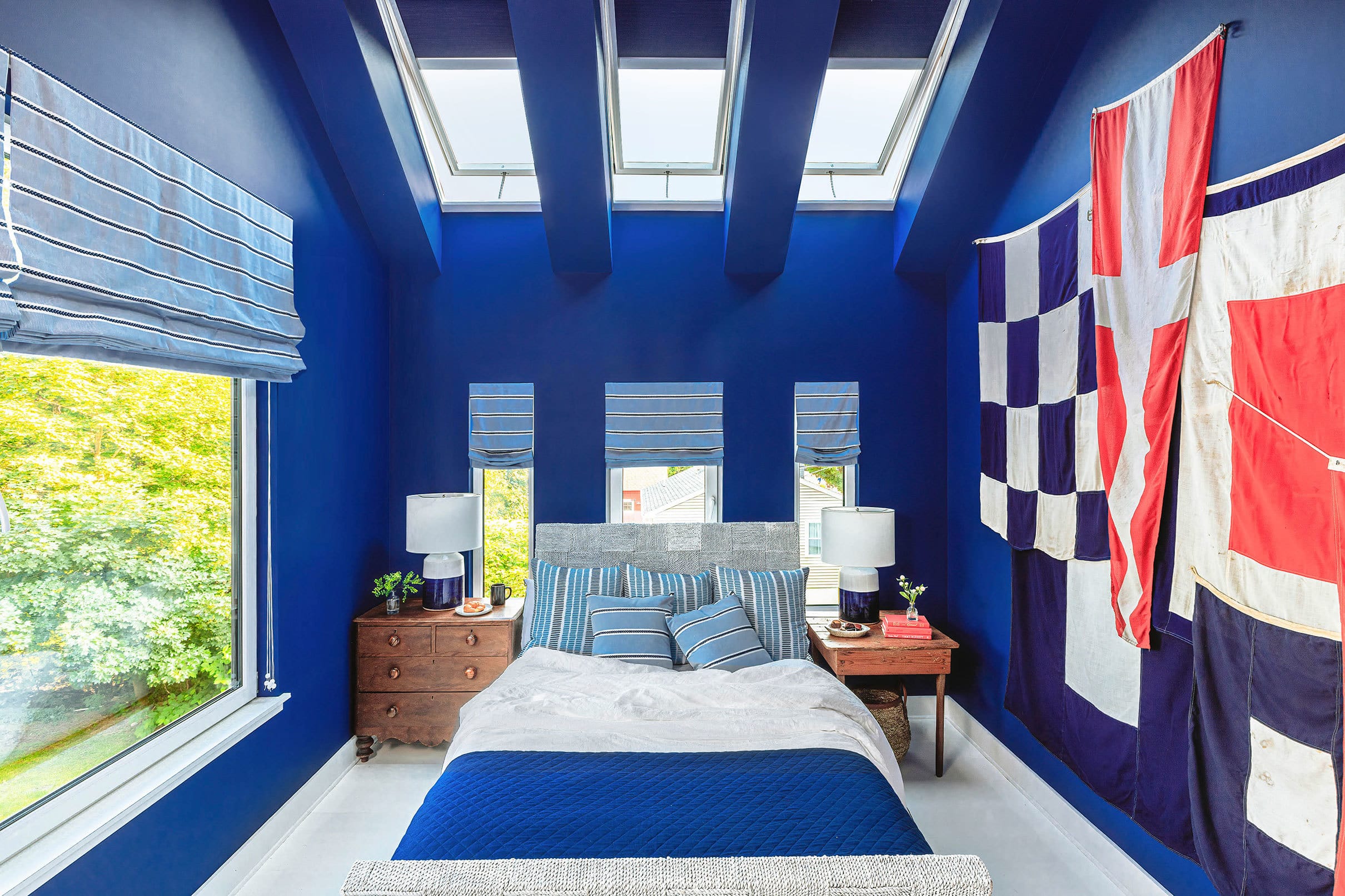 Blue main bedroom three skylights with blinds