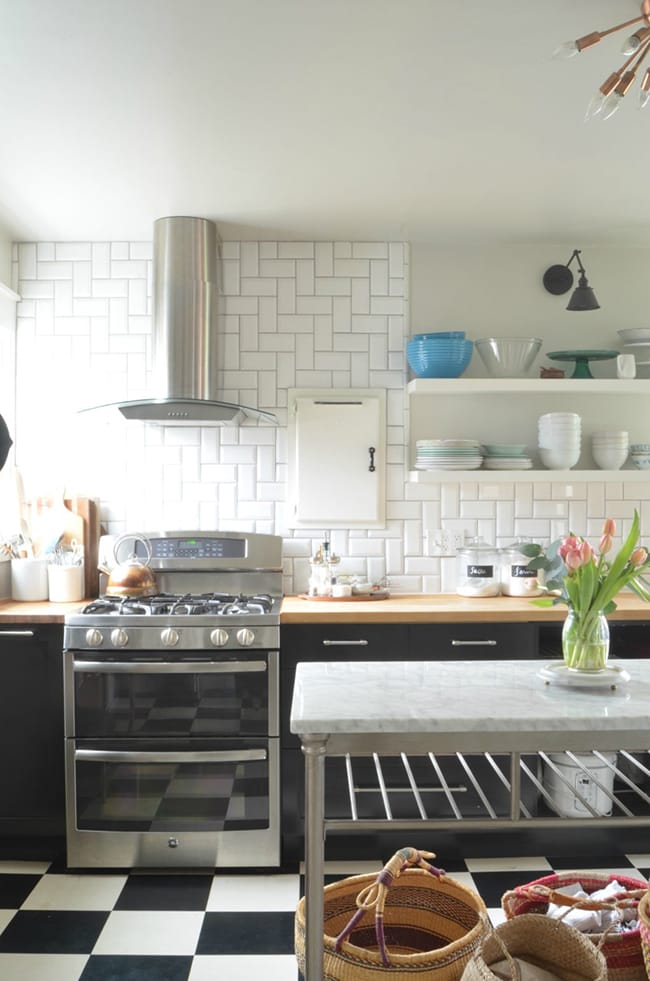 Black and white kitchen before skylights installed