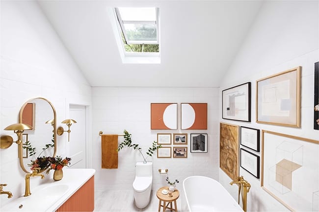 Skylight brightens bathroom gallery wall