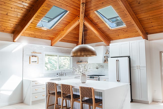 White kitchen wood ceiling after skylights installed